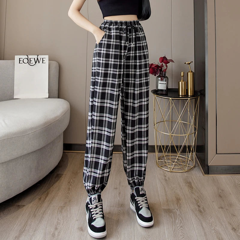 Pantalones de mujer, estilo harem, holgados, de cuadros negros, estilo Harajuku, ideales para el verano. Pantalones largos de mujer, elegantes y con estampado de pies.
