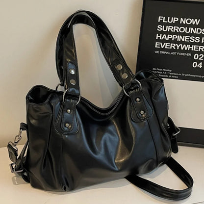 Bolso de hombro espacioso de marca retro para mujer, bolso cruzado clásico de lujo de color sólido, bolso de mano de cuero PU suave de gran capacidad.